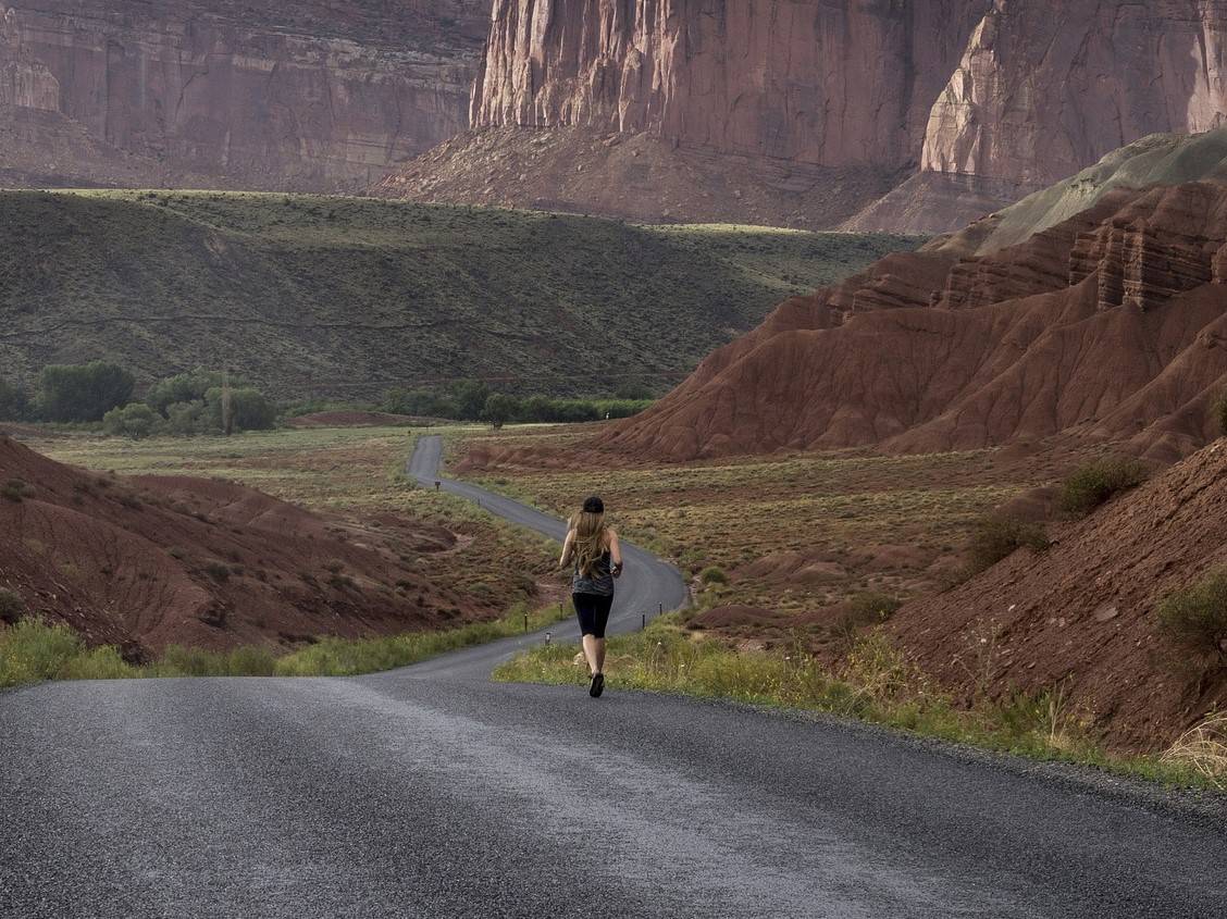 Woman running lots of miles training for a marathon.